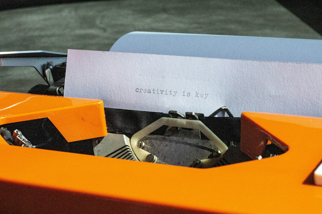 Typewriter with a sheet of paper