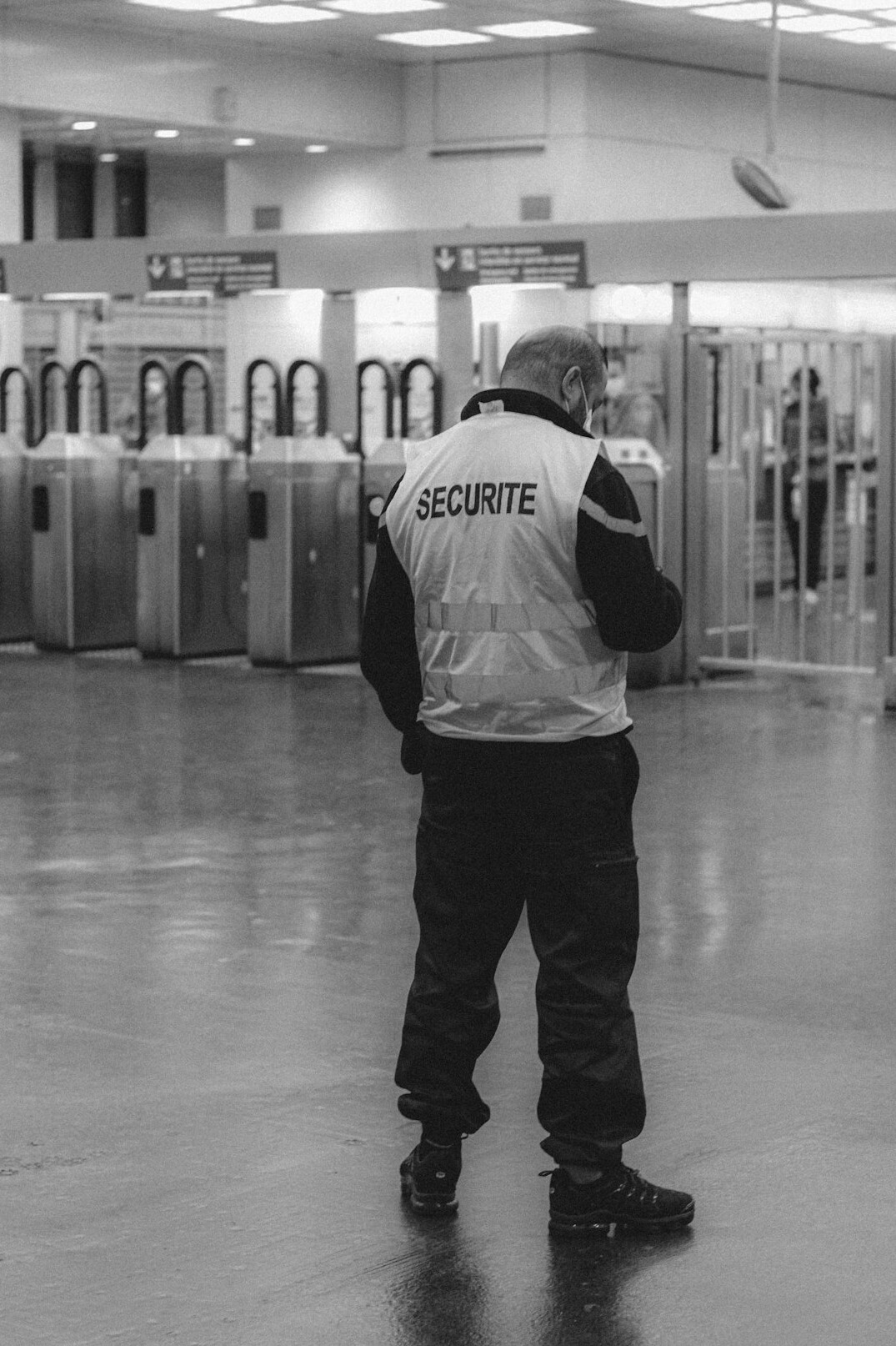 store security guard watching monitors