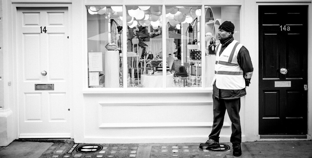store detective watching monitors